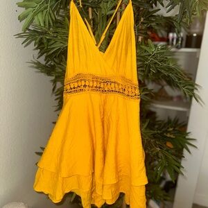 Yellow Ruffled Romper with Crocheted Detail